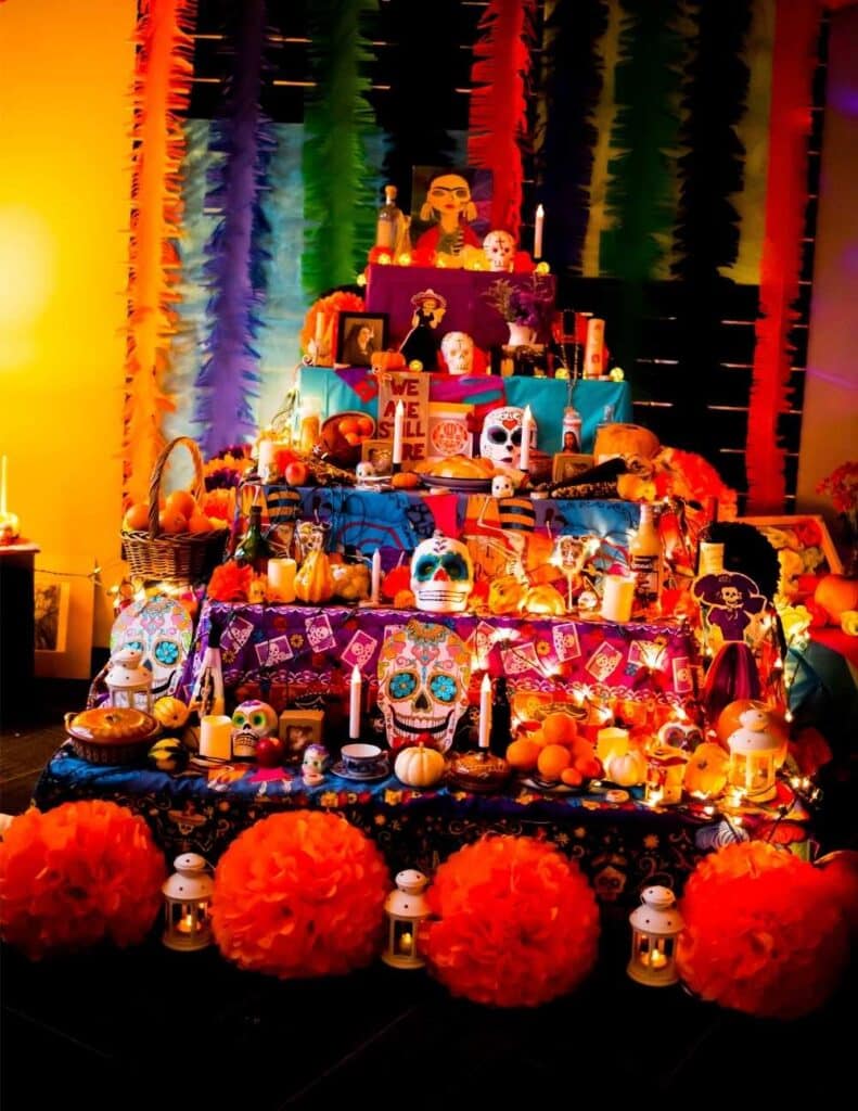 a colourful Mexican Day of the Dead altar is set up