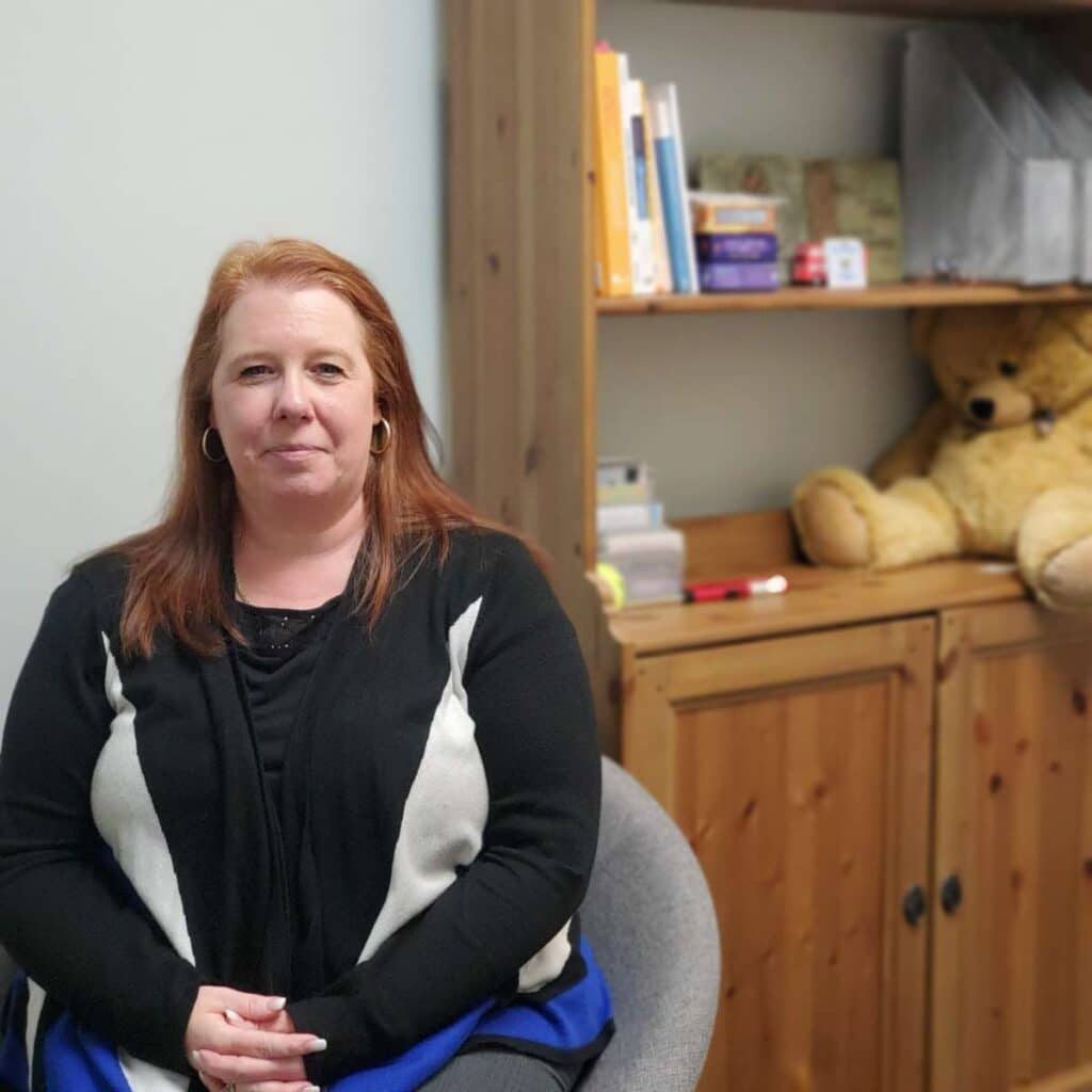 hospice counsellor in her office