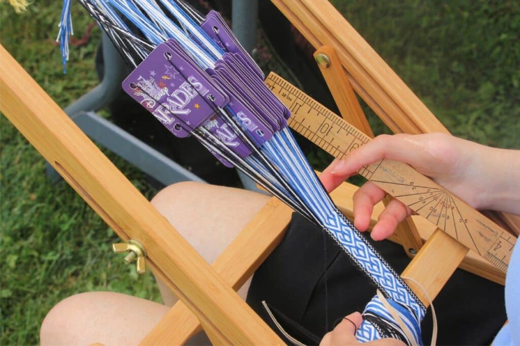 woman weaving wool