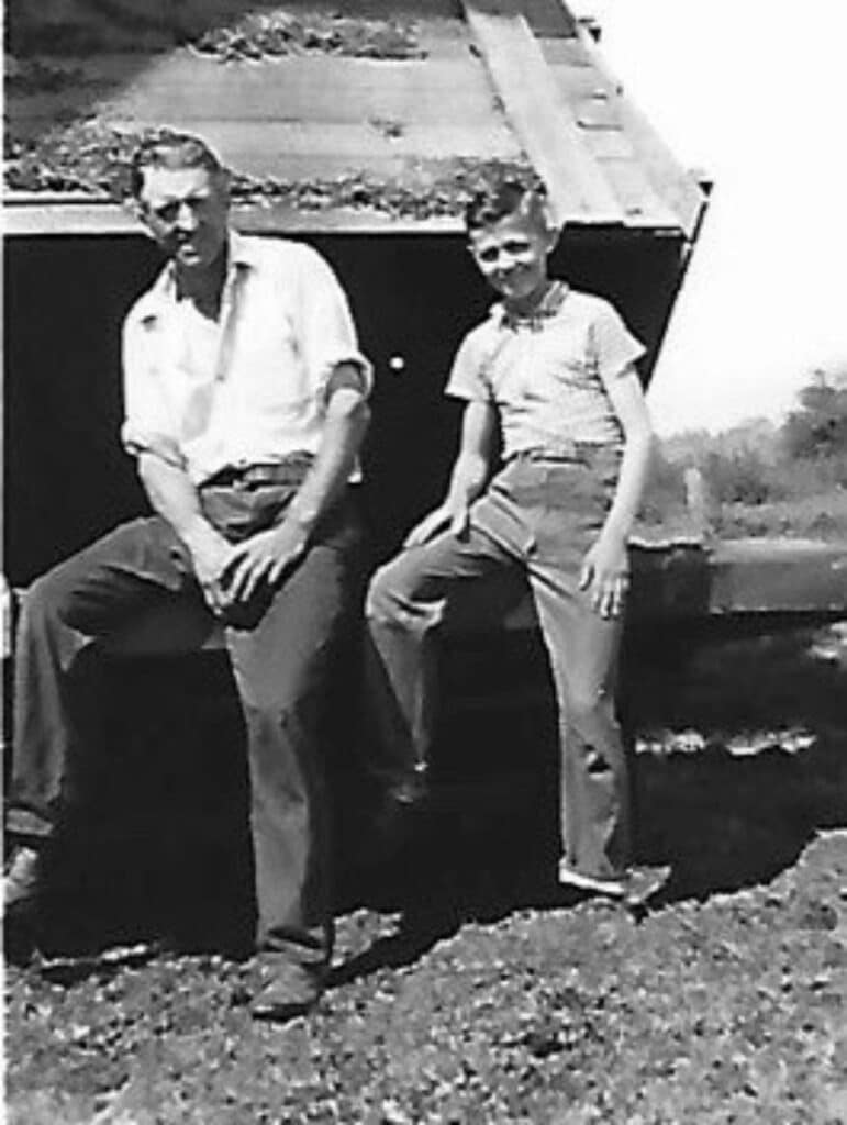 father and son in a farm